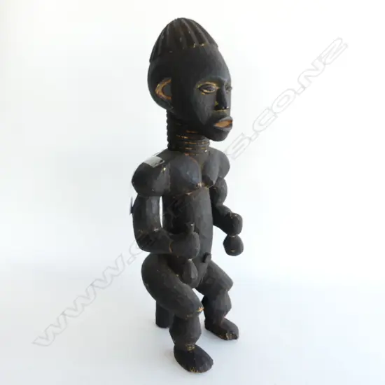 An African wooden female figure,